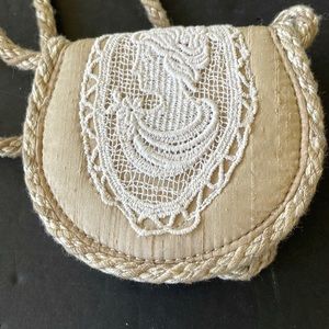 Across body silk tanned small purse with original label